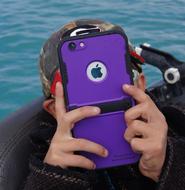 scuba diver with an iPhone in a waterproof case