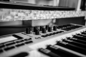 Black and white photo, with the close-up of the midi keyboard