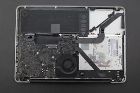 closep view of Inner Workings of Macbook Computer