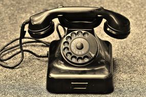 Retro photo of the beautiful, shiny, old, retro telephone headset