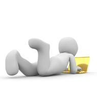 White figure, using gold laptop, at white background, on clipart