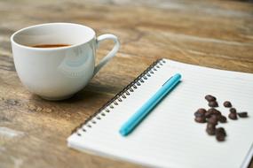 coffee beans on a notebook