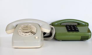 Shiny, old, retro, grey, cream and green phones