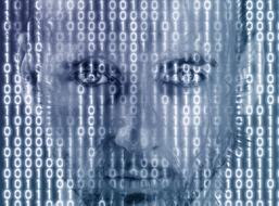 binary code in front of male face