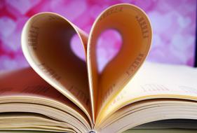 pages of an open book as a heart