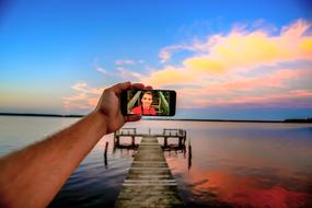 photo on beach at sunset