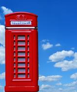 Red Phone Booth in England at blue sky