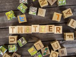 the inscription twitter from wooden cubes