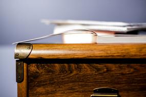 book on a wooden bedside table