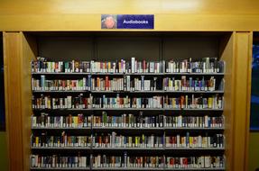 Audiobooks on shelves in library