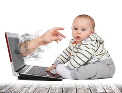 Baby and hand through the screen of the laptop, clipart