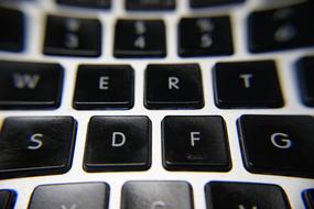 black buttons on a computer keyboard close-up