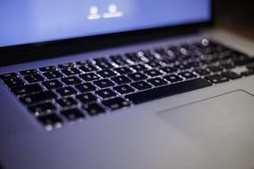 laptop keyboard in blurred background