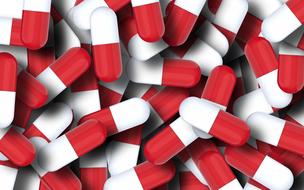 photo of many red and white capsules