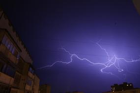 Lightning over building, Thunderstorm at night