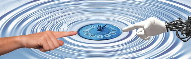 the hand of a man and a robot points to the clock