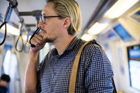 man talking by Cellphone
