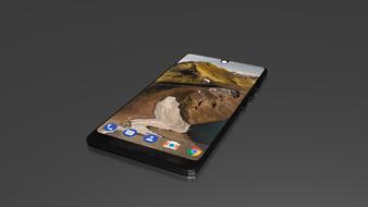 smartphone with mountain landscape as wallpaper