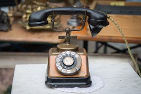 Close-up of the beautiful, vintage phone with the stand