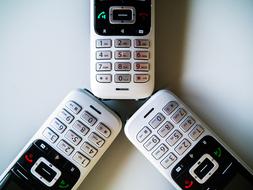 three office phones together