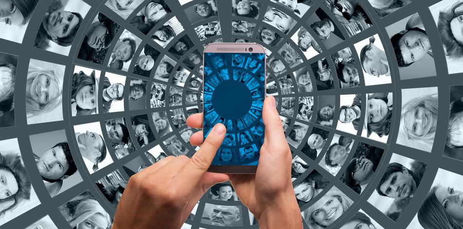 smartphone in hands on the background of the world wide web