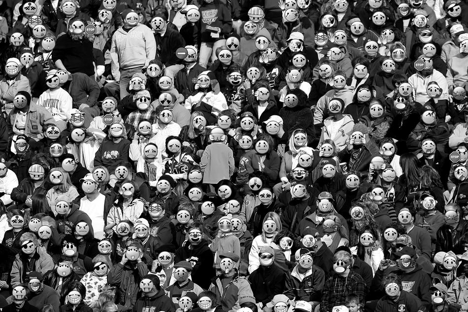 Black and white photo with the people with emoticons on the faces
