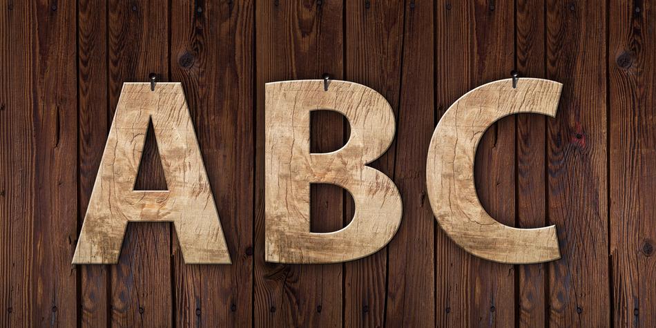 3d 'ABC' letters on the wooden background