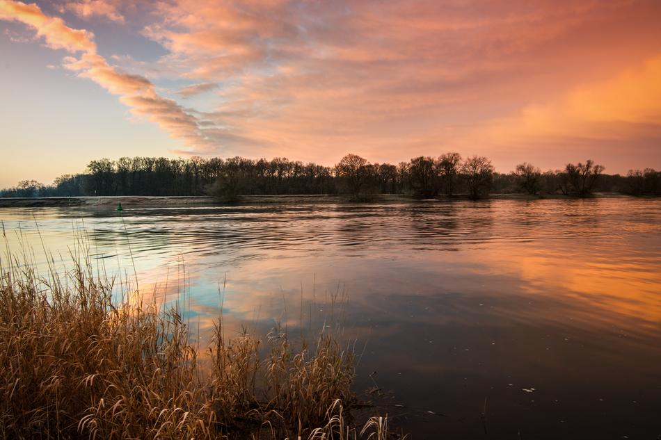 Sunrise over calm elbe River