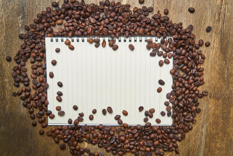 coffee beans as a frame for a notebook