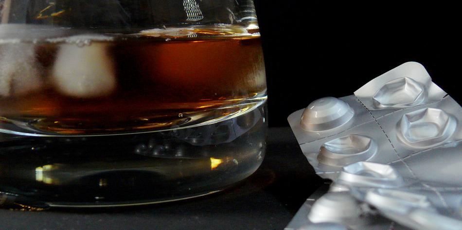 alcohol drink in glass and drugs