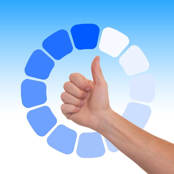 Thumb up and blue and white loading icon, at blue and white, gradient background