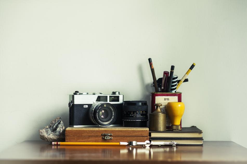 Camera and Pencils on desk