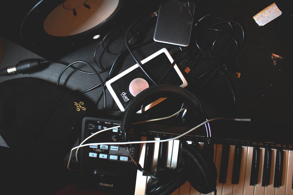 gadgets on piano keyboard