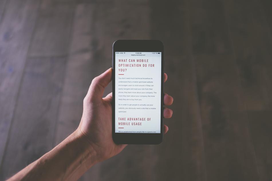 smartphone with text in hand of man