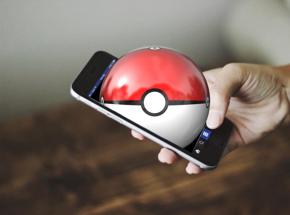 Person, playing Pokemon Go on Ihpone