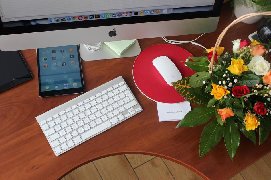 a basket of flowers at the workplace in the office