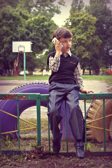 student talking on the phone at school