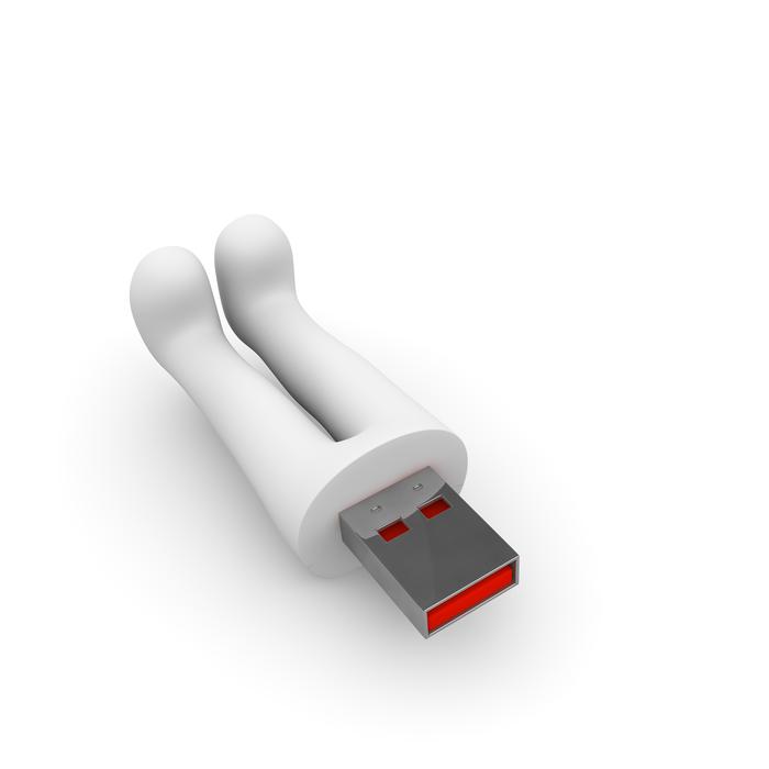 Usb stick, as legs of the white figure, at white background, on clipart