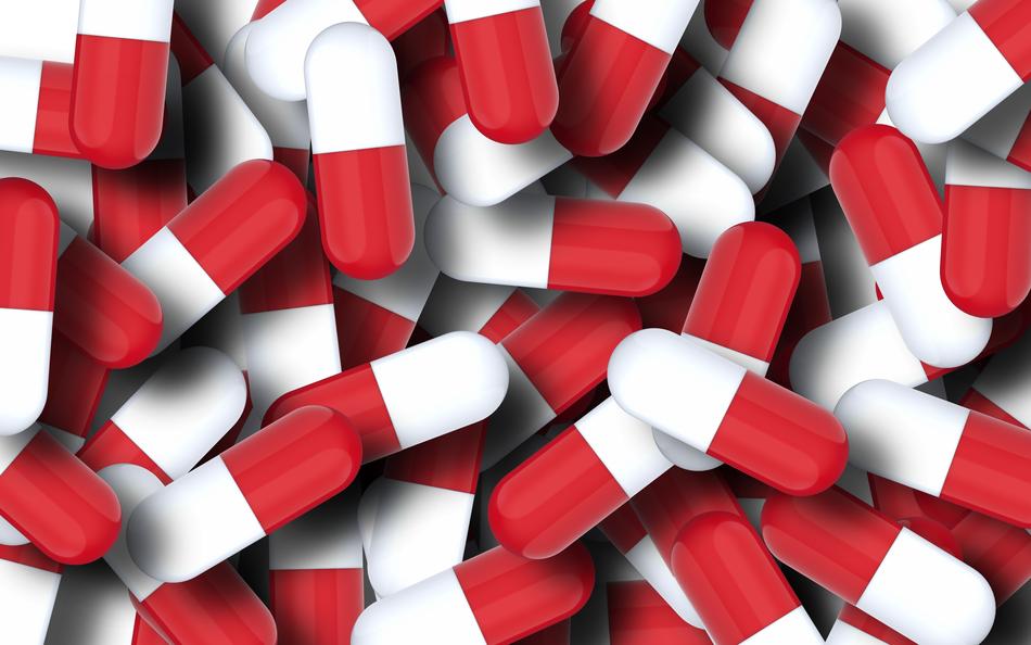 photo of many red and white capsules