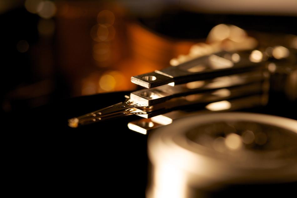 Close-up of the glossy hard drive, with the details, with the reflections