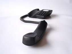 black phone on white surface