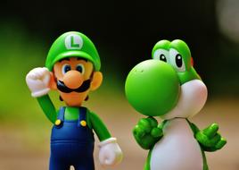green figurines yoschi and luigi