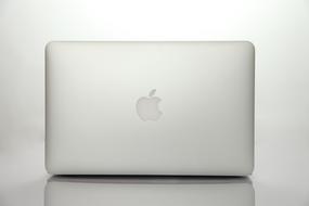 isolated white apple laptop