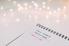 new yearâs resolutions, Notebook with handwriting, blur background