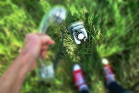vintage phone on grass in blurred background