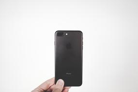 Iphone Apple in hand on white background