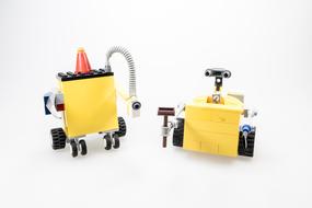 Colorful "Lego" Wall-e figures, on white surface