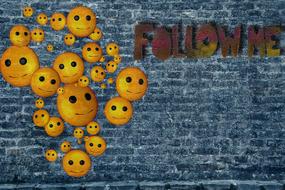 follow on the wall with emoticons