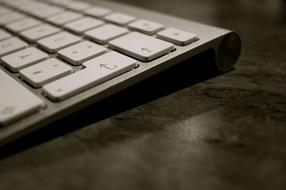 gray keyboard on the table close up