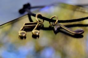 notes as decorations on a string on a blurred background